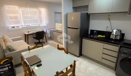 Vende Studio com garagem no Maxplaza, bairro Marechal Rondon Canoas - RS