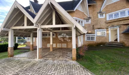 Casa 3 dormitórios em Condomínio fechado no bairro Planalto em Gramado