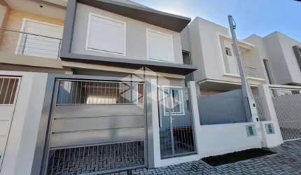 Sobrado novo 3 dormitórios sendo 2 suítes no bairro Nossa Sra das Graças.