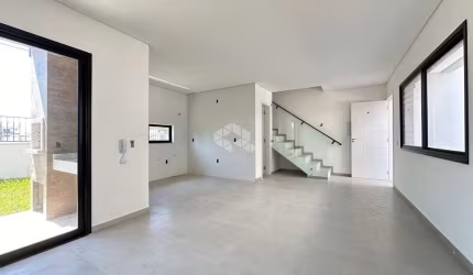 CASA GEMINADA  3 DORMITÓRIOS SENDO UMA SUÍTE COM GARAGEM E QUINTAL COM CHURRASQUEIRA NOVA PALHOÇA/SC