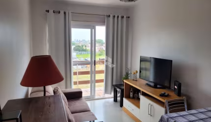 Excelente Apartamento amplo mobiliado de 1 dormitório com sacada aberta, sol norte e localização privilegiada no bairro Passo D'areia