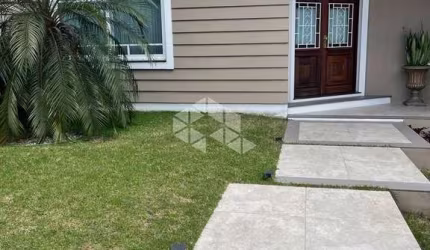 Casa em condomínio fechado com 3 quartos à venda na Avenida Senador Salgado Filho, 8500, Jardim Krahe, Viamão, 260 m2 por R$ 1.490.000
