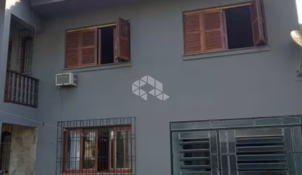 Casa de 03 dormitórios no Bairro Neópolis em Gravataí.