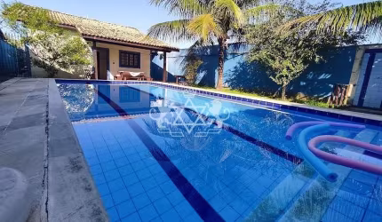 Casa térrea + edícula, à venda no bairro Porto novo em Caraguatatuba SP