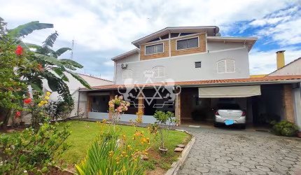Sobrado à venda, 4 suítes, mezanino, 450m² total, Jardim Aruan, Caraguatatuba, Litoral Norte de São