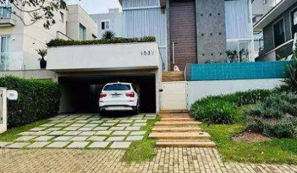 CASA EM CONDOMÍNIO 4 DORMITÓRIOS (300m²), 4 SUÍTES, MOBILIADA, VARANDA, 4 VAGAS. NO CONDOMÍNIO BURLE MARX