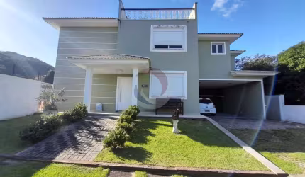 Casa em condomínio fechado com 3 quartos para alugar na Rua da Capela, 505, Campeche, Florianópolis por R$ 14.000