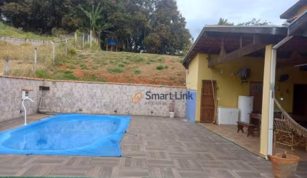 Chácara com 2 dormitórios à venda, 2700 m² por R$ 590.000,00 - Chácara Dallas - Taubaté/SP
