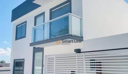 Casa com 3 dormitórios à venda, 160 m² por R$ 765.000,00 - Buraquinho - Lauro de Freitas/BA