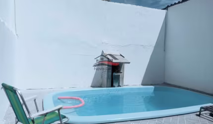 Casa com 2 Dormitórios e piscina à venda no Golfinho - Caraguatatuba  SP