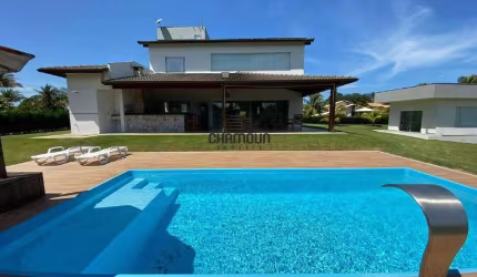 Casa em condomínio com 5 suítes e Área de lazer completa para venda em Guarapari/ES.