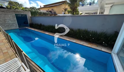 Casa em condomínio fechado com 4 quartos à venda na Benedito Lauro de Camargo (rua 82), --, Jardim Acapulco, Guarujá por R$ 3.000.000
