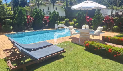 Casa em condomínio fechado com 4 quartos à venda na Quarenta e Nove (rua 49), --, Jardim Acapulco, Guarujá por R$ 3.250.000
