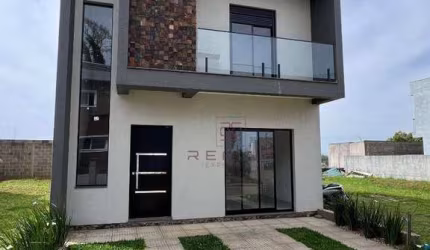 Sobrado com 3 dormitórios à venda, 119 m² por R$ 890.000,00 - Primavera - Gravataí/RS