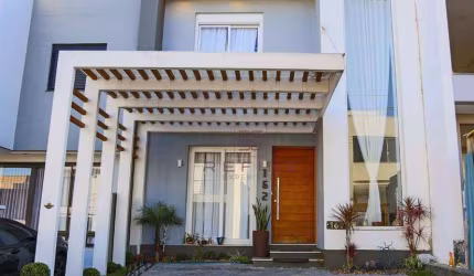 Sobrado com 3 dormitórios à venda, 137 m² por R$ 890.000,00 - Primavera - Gravataí/RS
