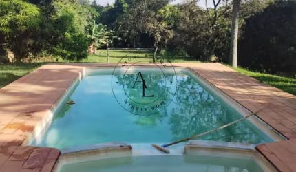 Refúgio dos Sonhos: Chácara com Piscina, Churrasqueira, Jardim e Campo de Futebol em 3.800m²