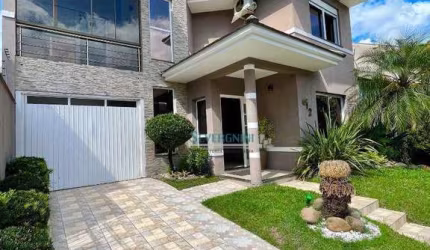 Sobrado com 3 dormitórios à venda, 183 m² por R$ 990.000,00 - Vale do Sol - Cachoeirinha/RS