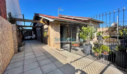 Casa com 2 dormitórios à venda, 105 m² por R$ 600.000,00 - Jardim Do Bosque - Cachoeirinha/RS