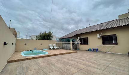 Casa com 3 dormitórios à venda, 105 m² por R$ 720.000,00 - Vale Ville - Gravataí/RS