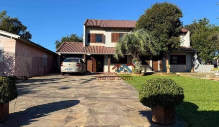 Casa com 4 dormitórios à venda, 250 m² por R$ 936.000,00 - Nossa Senhora das Graças - Canoas/RS