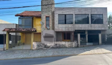 Ampla Residência Comercial no Bairro Salgado Filho: Conforto e Versatilidade no Centro de Gravataí