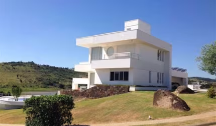 Casa com 5 dormitórios, 607 m² - venda por R$ 4.500.000,00 ou aluguel por R$ 21.616,00 - Condomínio Figueira Garden - Atibaia/SP