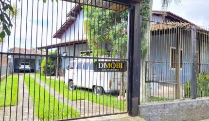Casa com 4 dormitórios à venda, 296 m² por R$ 870.000,00 - Natal - Gravataí/RS
