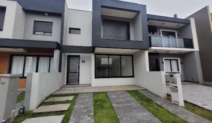 Sobrado com 3 dormitórios à venda, 160 m² por R$ 850.000,00 - Jansen - Gravataí/RS