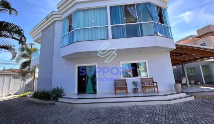 Casa de Luxo na Praia do Morro: Viva o Sonho à Beira-Mar