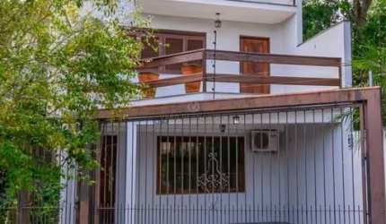 Casa com 3 quartos à venda na Rua Jayme Saul de Borba, 72, Espírito Santo, Porto Alegre por R$ 598.000