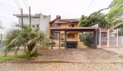 Casa com 4 quartos à venda na Rua Geminiano Candiota Xavier, 15, Espírito Santo, Porto Alegre por R$ 1.200.000