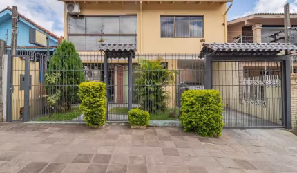 Casa com 3 quartos à venda na Estrada Vila Maria, 75, Cavalhada, Porto Alegre por R$ 860.000