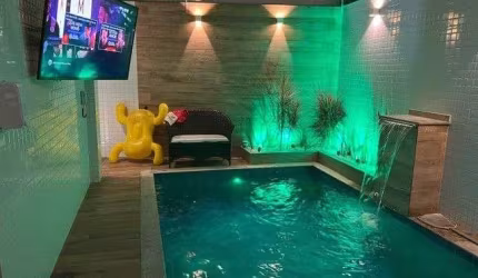 Casa com 3 dormitórios à venda, 250 m² por R$ 2.280.000,00 - Ponta da Praia - Santos/SP