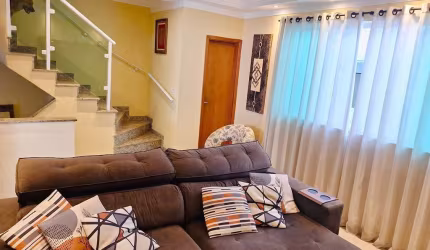 Sobrado com 3 dormitórios à venda, 116 m² por R$ 630.000,00 - Macuco - Santos/SP