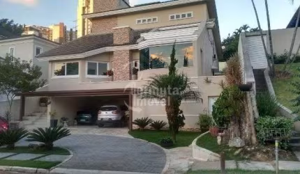Alphaville Residencial 01 - Casa com 450m², 4 suítes, 6 vagas, piscina, varanda e aquecedor solar no Residencial 01