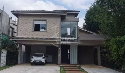 Casa para venda com 525 m², 3 suítes, lareira, sala de estar, cozinha e escritório no Condomínio Tamboré 10