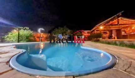 Casa em condomínio fechado com 3 quartos à venda na Rua VII, Limoeiro, Guapimirim, 202 m2 por R$ 700.000