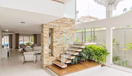 Casa com 4 dormitórios à venda, 667 m² por R$ 6.899.000,00 - Alphaville/SP