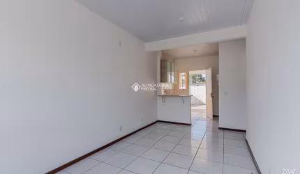 Casa em condomínio fechado com 2 quartos para alugar na Rua Santa Júlia, 56, Olaria, Canoas, 65 m2 por R$ 1.750
