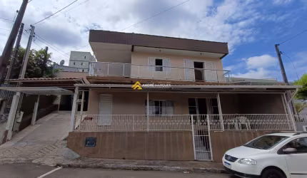 CASA COM SALA COMERCIAL
