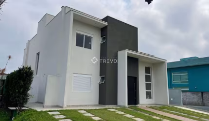 CASA COM 4 DORMITÓRIOS EM CONDOMINIO FECHADO À VENDA EM BERTIOGA/SP