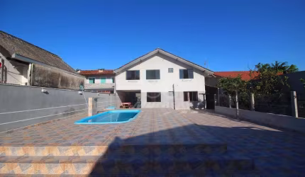 Casa com 7 dormitórios à venda, 318 m² por R$ 1.000.000,00 - Cohapar - Guaratuba/PR