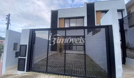 Sobrado à venda, alto padrão acabamento, 3 quartos sendo 1 suíte, 2 vagas, Bairro Fazenda, Itajaí-SC