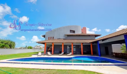 Luxuosa casa no Bairro Dunas com 5 suítes e vista para o mar.