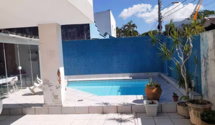 Casa com 4 dormitórios à venda, 250 m² por R$ 1.800.000,00 - Coqueiros - Florianópolis/SC