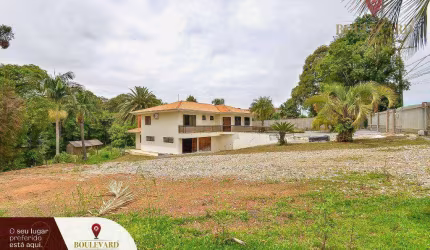 Terrenos na Rodovia da Uva com casa em alvenaria à venda, 22633 m² por R$ 5.659.000 - Embu - Colombo/PR