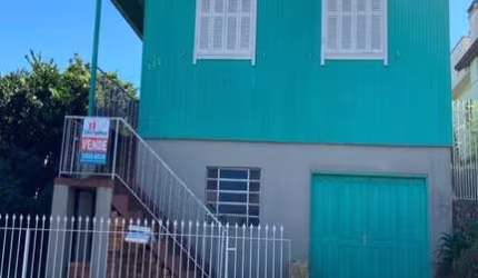 Casa com 3 quartos à venda na Rua Campos Júnior, 725, Rio Branco, Caxias do Sul por R$ 395.000