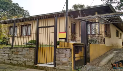 Casa com 4 quartos à venda na Honduras, 31, Jardim América, Caxias do Sul por R$ 689.000