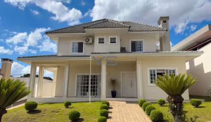 Casa em Condomínio com 4 suítes, 466 m² privativos, 6 vagas de garagem, no Uberaba, Curitiba - PR.