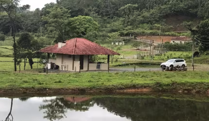 Chácara com 129.000 m², casa, ranchos, lagos, no Vila Nova, 80% limpa, escriturada, aceita troca